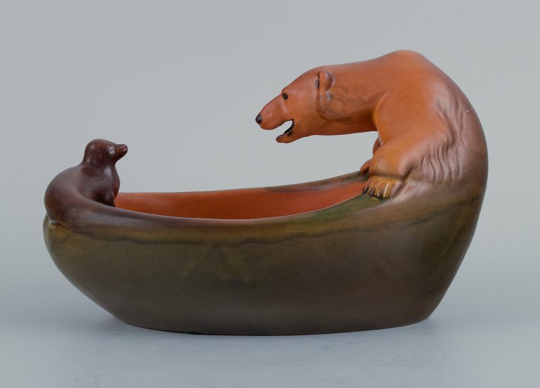 Ipsens, Denmark, bowl with polar bear and seal. Glaze in orange-green shades.