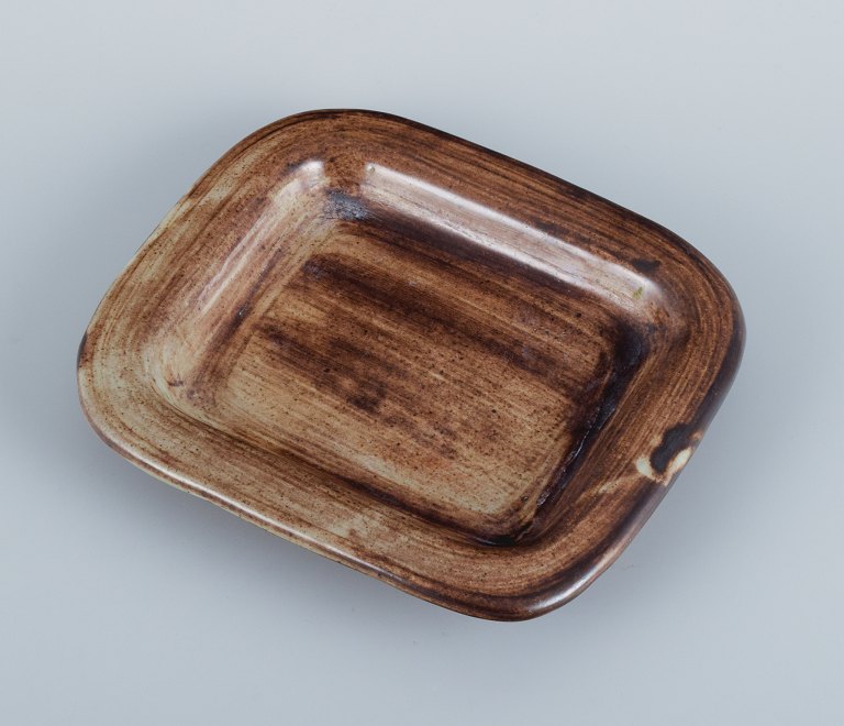 Dominique Pouchain (1956), France, unique ceramic dish in brown tones.