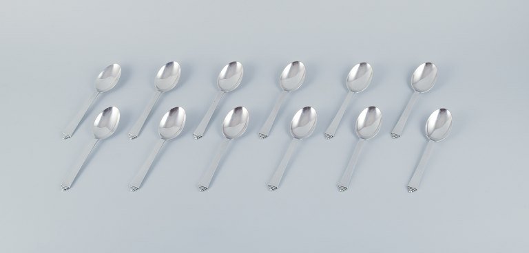 Georg Jensen Pyramid, a set of twelve dessert spoons in sterling silver.