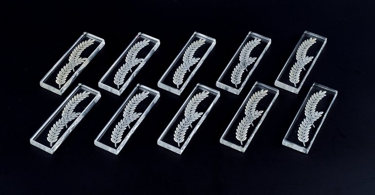 René Lalique, a set of ten  knife rests.