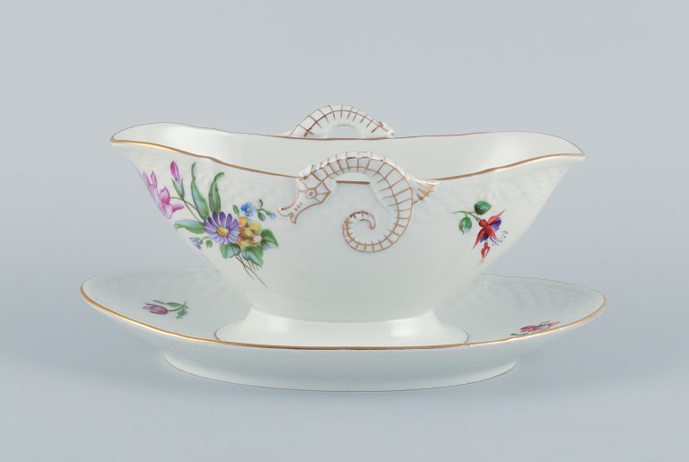 Bing & Grøndahl, Saxon Flower, a hand-painted sauce boat with handles shaped 
like seahorses.