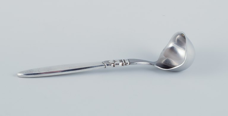 Georg Jensen, Cactus, a sterling silver and stainless steel  sauce spoon.