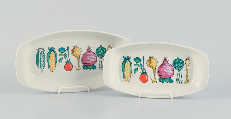 Villeroy & Boch, Luxembourg, two "Primabella" retro-style stoneware dishes 
featuring various vegetable motifs.