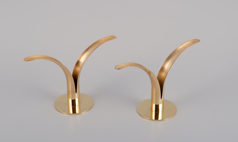 Ivar Ålenius Björk (1905-1978), Ystad Metall.
A pair of "Liljan" candle holders in brass.