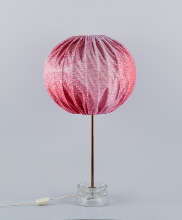 Josef Frank (1885–1967), large table lamp in glass and brass. Textile lampshade 
with pink tones and floral motifs.