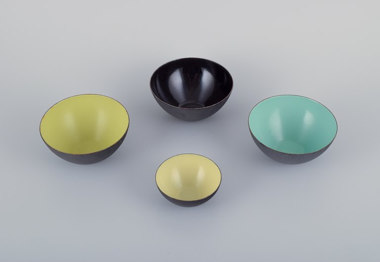 Hermann Krenchel, four Krenit metal bowls with enamel in black, mint green, 
apple green, and yellow.