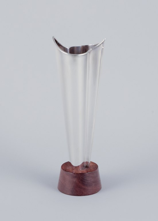 Tapio Wirkkala (1915-1985), Finnish silversmith. Modernist silver vase on a 
rosewood base.