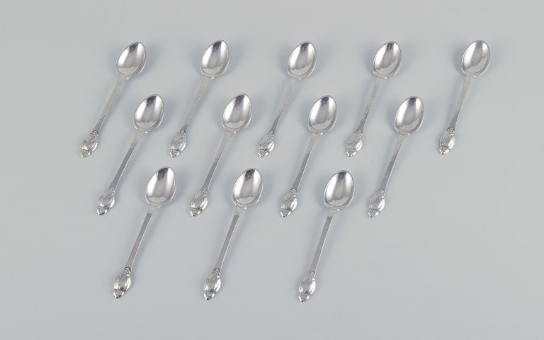 Evald Nielsen No 6, a set of twelve coffee spoons in 830 silver.
Hammered finish.