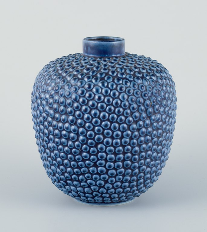 Ceramic vase in modernist design with blue glaze.