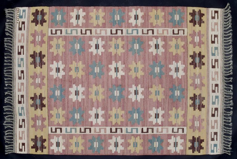 Märta Måås-Fjetterström (1873–1941), Swedish textile designer.
“Sipporna” (The Anemones). Handwoven unique wool carpet in "rölakan" technique 
with polychrome geometric pattern.
