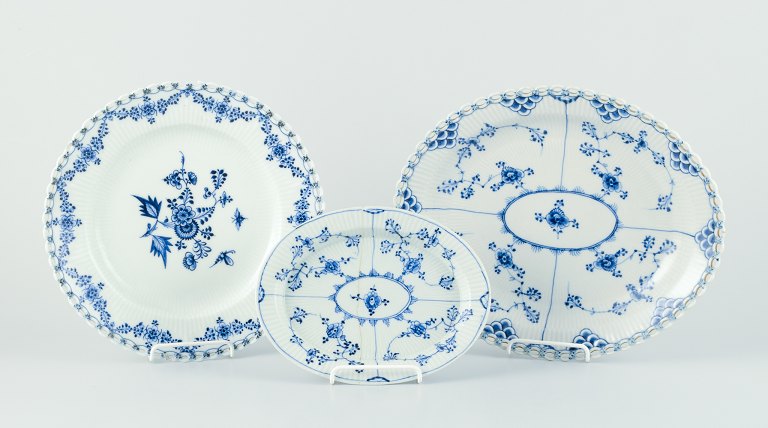 Royal Copenhagen. Three antique and very early Blue Fluted Plain and Blue Fluted 
Full Lace plate and a platters.