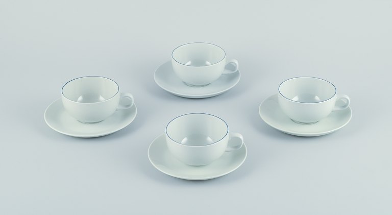 Four Aluminia/Royal Copenhagen blue line coffee cups and saucers.
Designed by Grethe Meyer.
