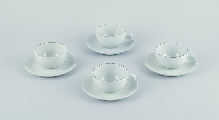 Four Aluminia/Royal Copenhagen blue line coffee cups and saucers.
Designed by Grethe Meyer.