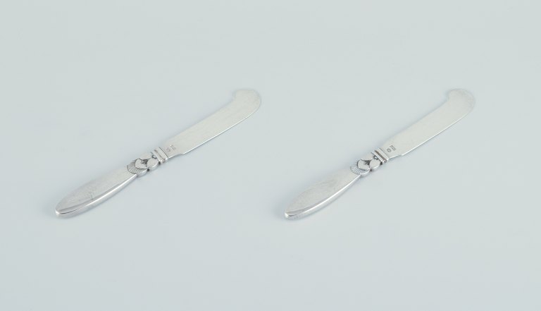 Georg Jensen Cactus. Two all-silver butter knives.