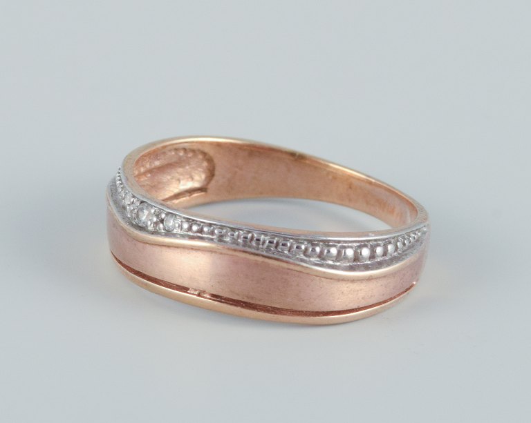 Danish goldsmith, 8 karat gold ring adorned with three diamonds. Art Deco 
design.