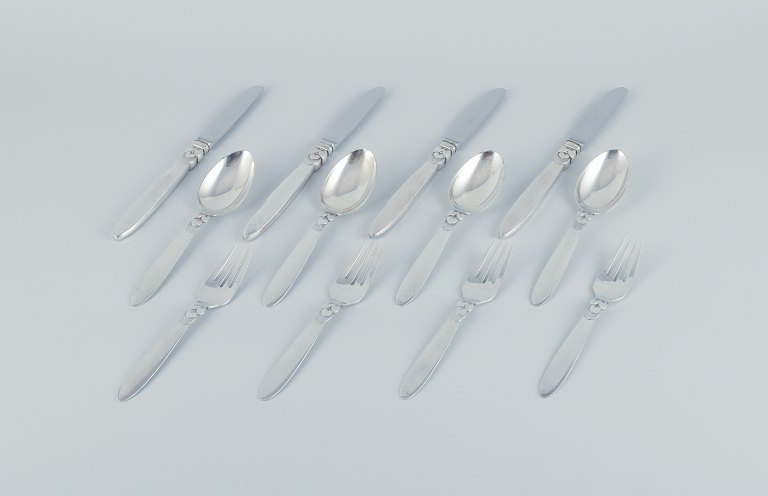 Georg Jensen Cactus. A four-person lunch set in sterling silver.
Comprising four long-handled lunch knives, four lunch forks, and four 
tablespoons.