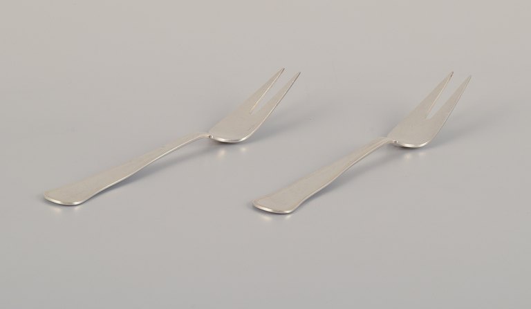 Cohr, Danish silversmith. Two "Old Danish" meat forks in 830 silver.