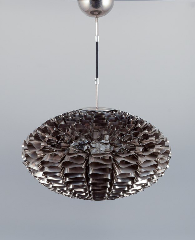 Britt Kornum for Normann Copenhagen. Ceiling lamp in stainless steel.
