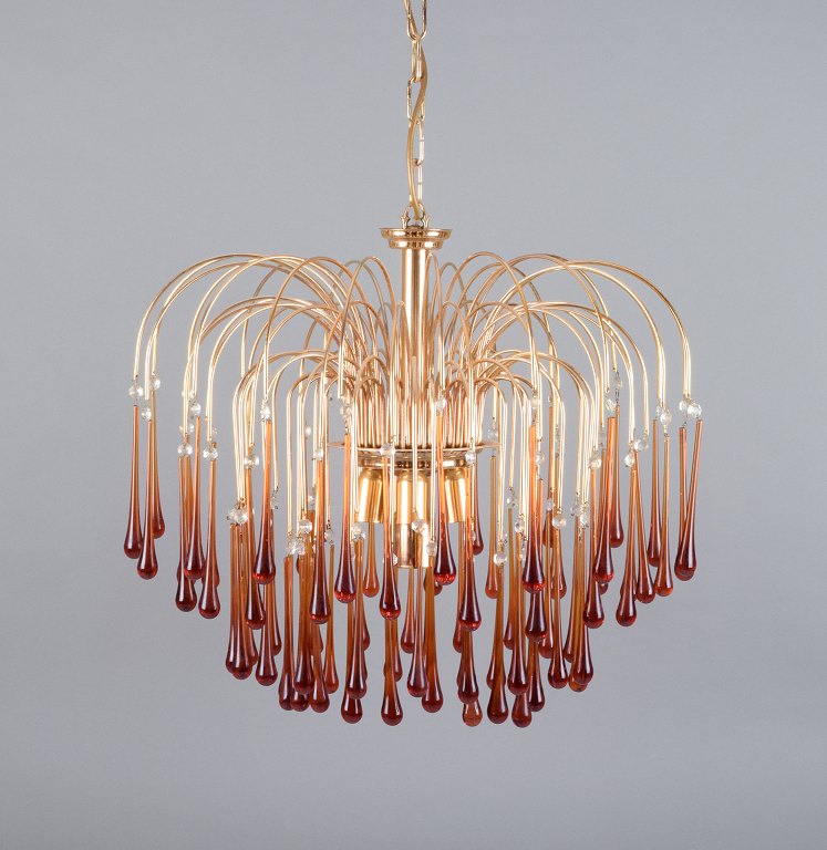 Murano, Italy. Large ceiling lamp in amber mouth-blown art glass, brass frame. 
Italian design.