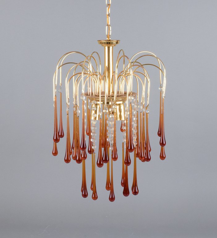 Murano, Italy. Ceiling lamp in amber mouth-blown art glass, brass frame. Italian 
design.