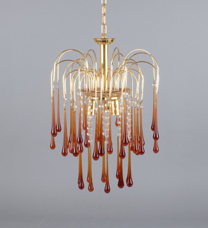 Murano, Italy. Ceiling lamp in amber mouth-blown art glass, brass frame. Italian 
design.
