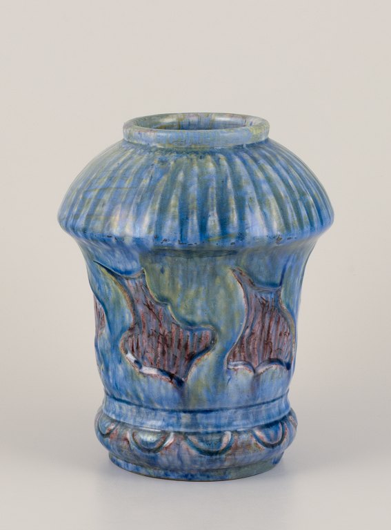 Møller & Bøgely, Denmark. Danish Art Nouveau ceramic vase in the style of 
Bindesbøll. Glaze in blue and green tones.