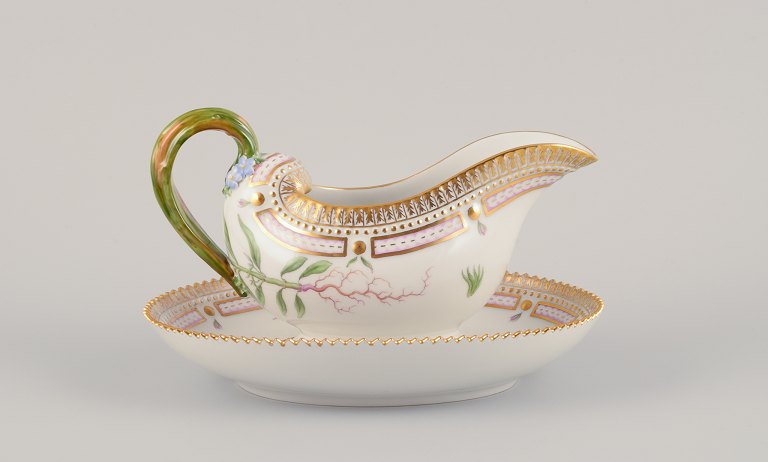 Royal Copenhagen Flora Danica sauce boat on a pedestal with a leaf-shaped 
handle.