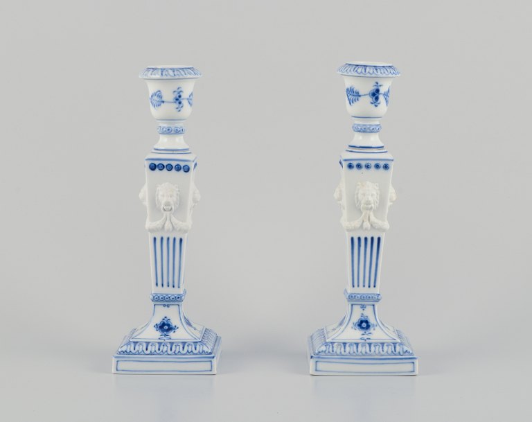 Royal Copenhagen, a pair of Blue Fluted candlesticks.