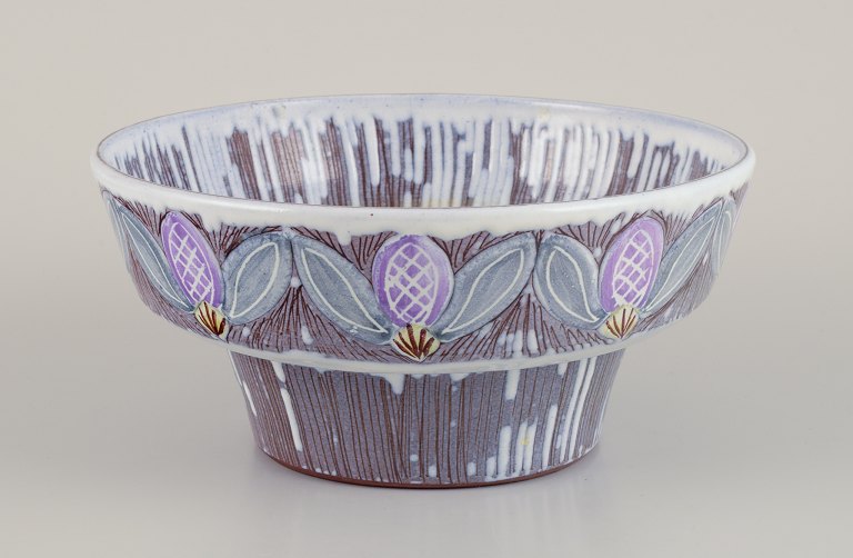 Olof Larsson for Laholm, Sweden. Ceramic bowl with polychrome glaze and floral 
motifs.