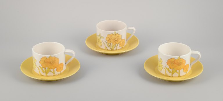 Ernestine Salerno, Italy. Three large coffee cups/morning cups with saucers. 
Hand-painted with sunflowers.