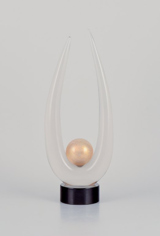 Archimede Seguso for Murano, Italy. Large art glass sculpture.
Clear glass on a black base with a gold-colored sphere. Mouth-blown.