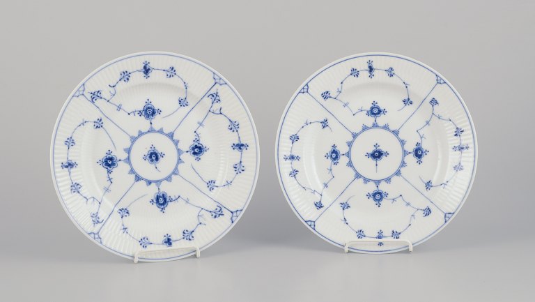 Royal Copenhagen Blue Fluted Plain, two deep dinner plates.