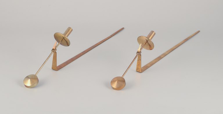 Skultuna, Sweden. A pair of wall-mounted candle sconces in brass.
Designed by Pierre Forsell in the 1970s.