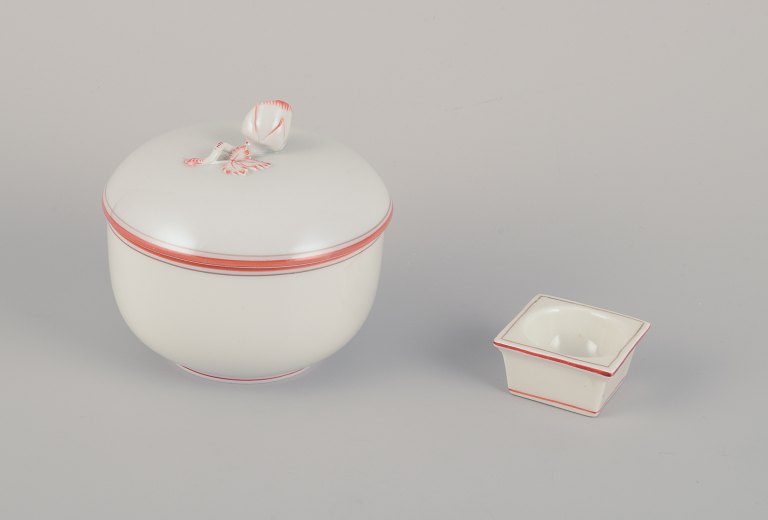 Meissen, Germany. A sugar bowl and a salt cellar. Decorated with coral red and 
gold-colored trim. Art Deco.