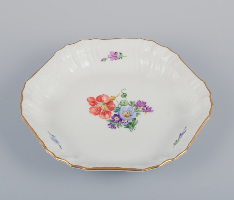 Royal Copenhagen Saxon Flower. Porcelain bowl. Hand-painted with polychrome 
flowers. Gold rim.