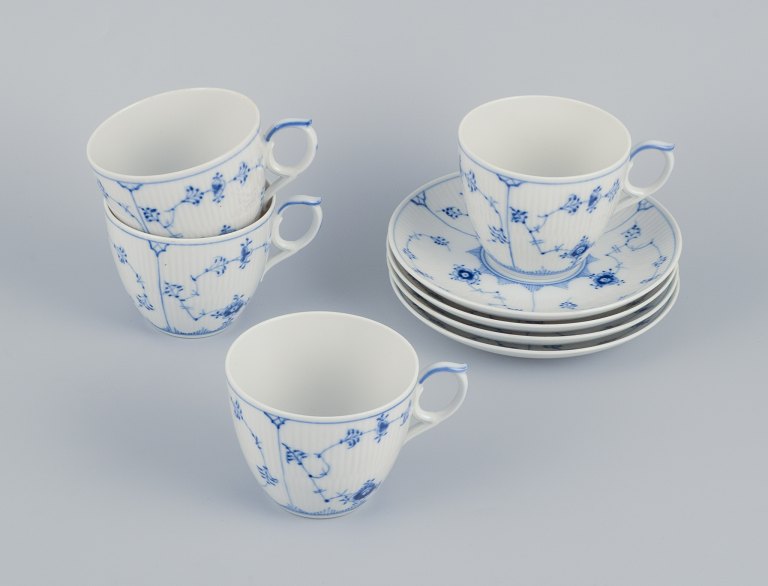 Royal Copenhagen Blue Fluted Plain, four coffee cups with saucers. Rare cup in 
an extra-large size.