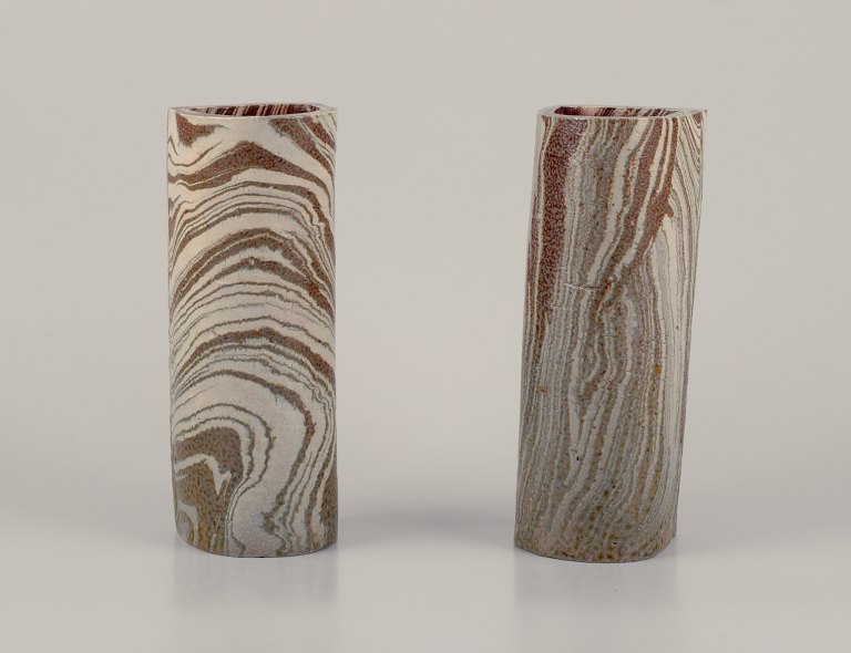 European Studio Ceramicist.
A pair of unique ceramic vases.