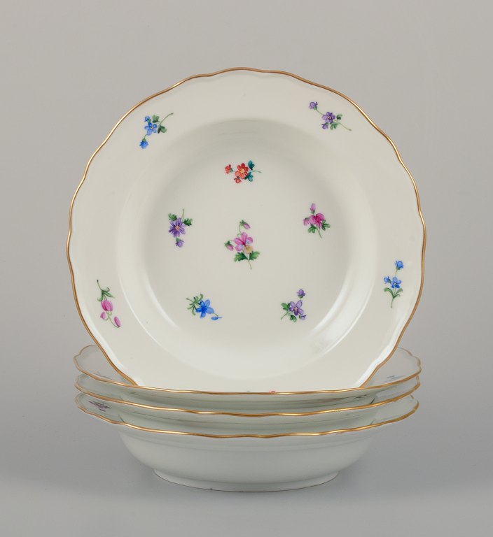 Meissen, Germany.
A set of four deep plates in porcelain.