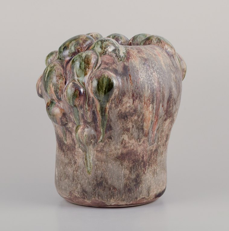 Christina Muff, Contemporary Danish ceramic artist (born 1971).
This large, one of a kind vase has a classical base with organic add-ons.