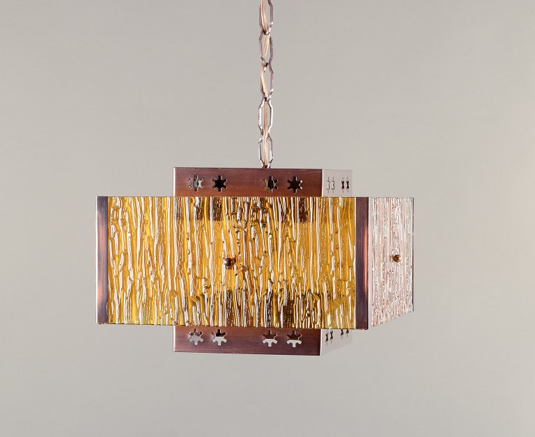 Venhola, Finland. Ceiling lamp in brass and amber-colored glass.