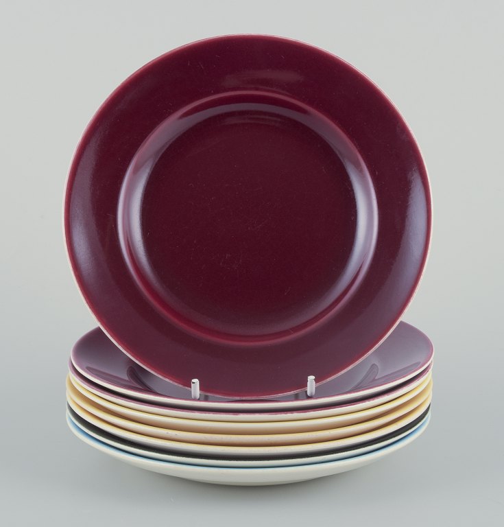 Eight Aluminia "Confetti" plates in glazed earthenware. Different colours.