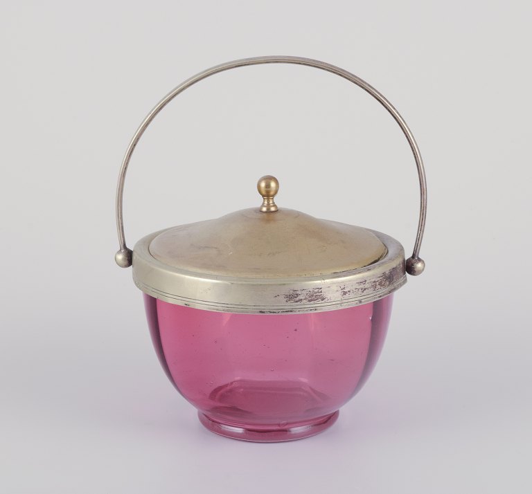 Danish bonbonnière in purple art glass.