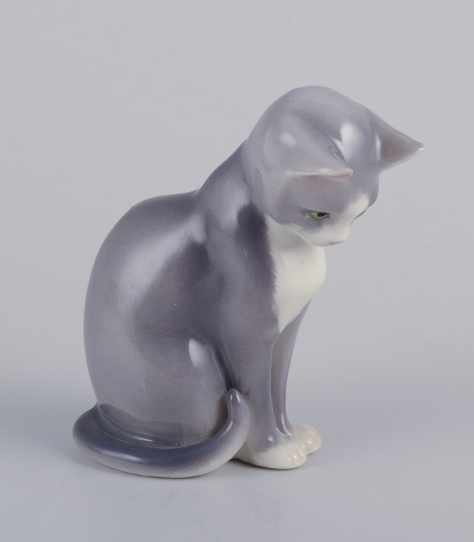 Royal Copenhagen. Porcelain figurine of a sitting cat.