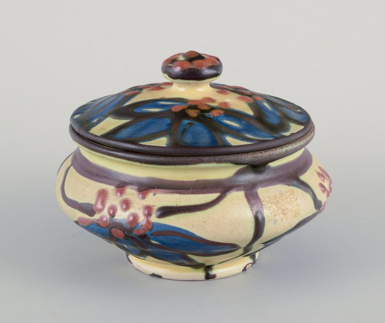 Kähler bonbonniere. 
Decorated with flowers. Cow horn technique.