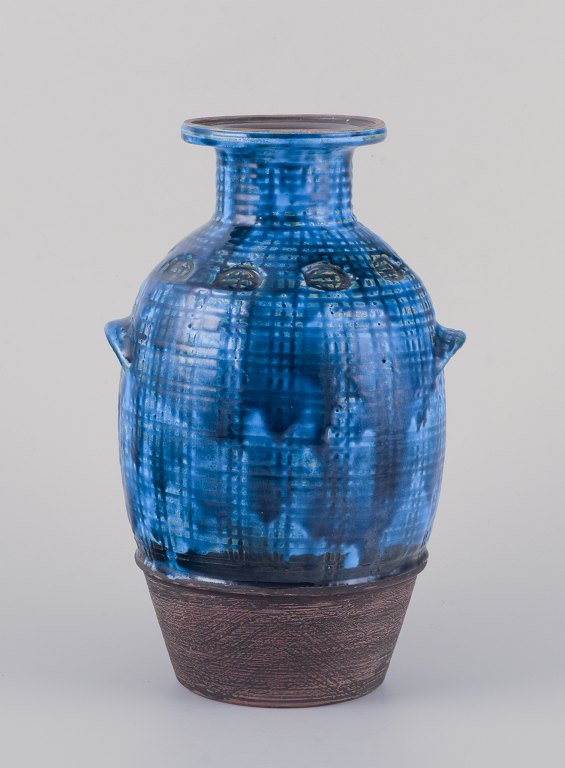 Aldo Londi for Bitossi. Vase in Rimini blue glazed ceramic with geometric 
patterns. Classic form with handle.