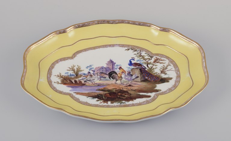Antique Meissen tray made of porcelain.
Hand-painted with a motif of birds in a park landscape.