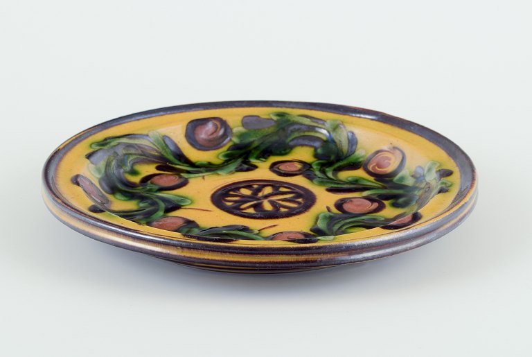 Kähler, Denmark.
Dish/wall relief made of ceramic with floral motif.