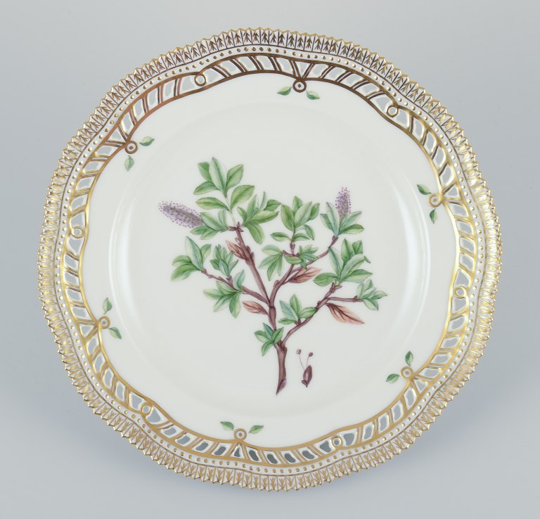 Royal Copenhagen Flora Danica open lace plate in hand painted porcelain with 
flowers and gold decoration.