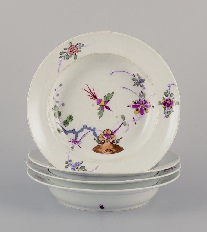 Meissen, Germany. A set of four antique porcelain soup plates.
Hand-painted, ‘Kakiemon’ decoration.