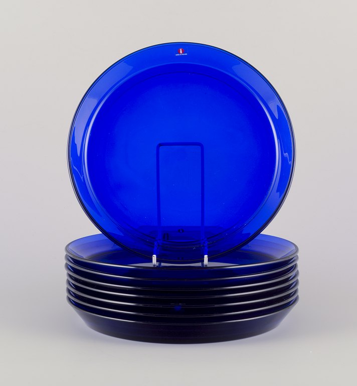 Kaj Franck (1911-1989) for Iittala, Finnish glass artist.
A set of eight ‘Kartio’ plates in blue art glass.